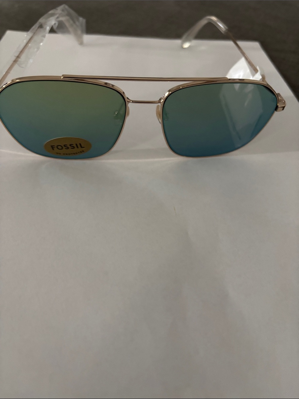 Fossil Gold Frame Sunglasses with Teal Mirrored Lenses. Brand new never worn